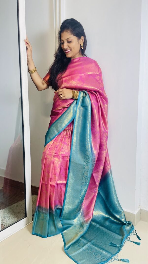 Pink Kancheepuram semi silk saree with light blue border