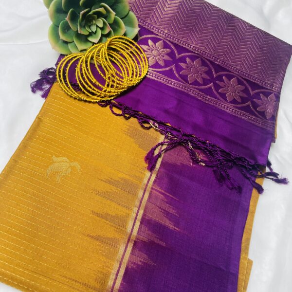 Mustard pure silk saree with violet border and pallu with golden thread line all over