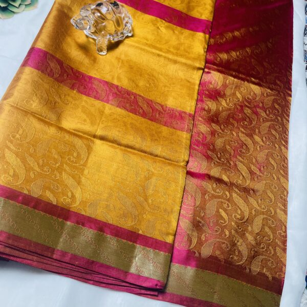 Mango yellow pure silk weightless saree with pink broder and self print all over