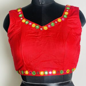 Red blouse with glass work on the neck