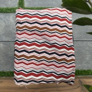 Red cream and black zig zag lines in pure soft cotton running material