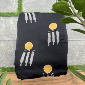 Black modal silk running material with yellow and white print