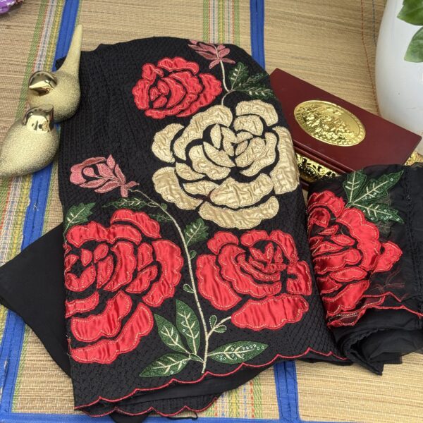 Black muslin set with golden and red big flowers pakistani Churidhar set