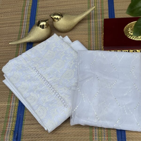 Pure white churidhar in kota with full chikankari work and kota dupatta