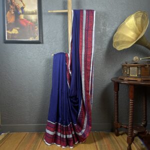Blue saree with red and white thread work border